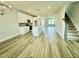 Spacious kitchen with white cabinets and an island with a sink at 1915 Plott Balsam Dr, Wendell, NC 27591
