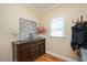 Bedroom with dresser, decor and natural light at 2008 Corberrie Ln, Raleigh, NC 27613