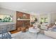 Cozy living room with brick fireplace and stylish decor at 2008 Corberrie Ln, Raleigh, NC 27613