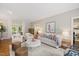 Spacious living room with hardwood floors and a comfortable seating area at 2008 Corberrie Ln, Raleigh, NC 27613