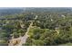 Scenic aerial perspective of a residential community with tree-lined streets and tidy homes on landscaped properties at 2021 W Front St, Burlington, NC 27215