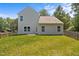 Well-kept backyard featuring a lush green lawn, enclosed by a classic wooden fence for added privacy at 2021 W Front St, Burlington, NC 27215