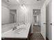 Modern bathroom with double sinks, wood cabinets and ample counter space at 2021 W Front St, Burlington, NC 27215