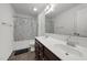 A full bathroom featuring double sinks and a shower and tub combination at 2021 W Front St, Burlington, NC 27215