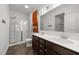 Bathroom with double vanity, glass shower, and modern fixtures at 2021 W Front St, Burlington, NC 27215