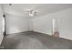 Large bedroom featuring neutral carpet and ceiling fan at 2021 W Front St, Burlington, NC 27215