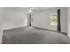 Spacious bedroom with neutral carpet and ample natural light at 2021 W Front St, Burlington, NC 27215