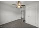 Bright bedroom featuring neutral walls, ceiling fan, and access to the ensuite at 2021 W Front St, Burlington, NC 27215