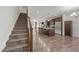 Open kitchen featuring stainless steel appliances, granite countertops, and dark wood cabinets at 2021 W Front St, Burlington, NC 27215
