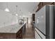 Modern kitchen featuring a large island with seating, sleek appliances, and ample counter space for cooking at 2021 W Front St, Burlington, NC 27215