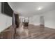 Open floor plan with hardwood floors and modern furnishings at 2021 W Front St, Burlington, NC 27215