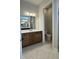 Bathroom with a vanity and drawers, a mirror and a separate toilet area at 2036 Abbeyhill Dr # 99, Raleigh, NC 27610