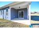 Covered back patio ideal for outdoor entertaining and dining at 21 Abingdon Farms Dr, Selma, NC 27576