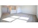 Bright, open bedroom featuring neutral walls and plush carpeting at 21 Abingdon Farms Dr, Selma, NC 27576