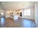 Open kitchen featuring stainless steel appliances, granite countertops, and a large center island at 21 Abingdon Farms Dr, Selma, NC 27576