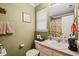 Bathroom with neutral walls, a single window, and a shower-tub combination with shower curtain at 2116 Sterling Creek Ln, Franklinton, NC 27525