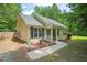 Charming single-story home featuring a cozy front porch and well-maintained landscaping at 2116 Sterling Creek Ln, Franklinton, NC 27525