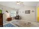 Comfortable living room with a high ceiling, neutral carpet, and a bright window at 2116 Sterling Creek Ln, Franklinton, NC 27525