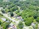 Aerial view shows the home and the lot boundaries in relation to the neighborhood at 219 E Nash St, Spring Hope, NC 27882
