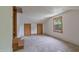 Unfinished attic space with wooden staircase, perfect for a renovation project at 219 E Nash St, Spring Hope, NC 27882