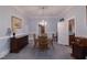 Formal dining room featuring a chandelier, wood table with chairs, and classic furnishings at 219 E Nash St, Spring Hope, NC 27882