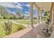 Inviting front porch with decorative tile and comfortable seating, perfect for relaxing outdoors at 219 E Nash St, Spring Hope, NC 27882
