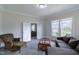 Spacious living room with comfortable seating and plenty of natural light at 219 E Nash St, Spring Hope, NC 27882