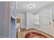 Mud Room with built in blue cabinets and tile flooring provides space to organize before entering main living area at 219 E Nash St, Spring Hope, NC 27882
