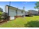 Spacious backyard with a utility door and back deck at 2324 Hoskins Rd, Burlington, NC 27215