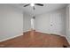 A bedroom with hardwood floors and a ceiling fan at 2324 Hoskins Rd, Burlington, NC 27215