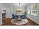 Cozy dining room with a round table, comfortable chairs, and a chandelier, great for Gathering meals at 2324 Hoskins Rd, Burlington, NC 27215