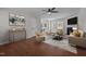 Bright and airy living room featuring hardwood floors, a fireplace, and neutral decor at 2324 Hoskins Rd, Burlington, NC 27215