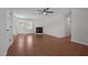 Comfortable living room with hardwood floors and a fireplace, perfect for relaxing and entertaining at 2324 Hoskins Rd, Burlington, NC 27215