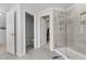 Bright bathroom featuring a glass enclosed tiled shower with a tiled niche and vanity at 2346 Mckenzie Ridge Ln, Apex, NC 27502