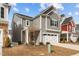 Attractive two-story home with neutral siding and a two-car garage, complemented by a landscaped front yard at 2346 Mckenzie Ridge Ln, Apex, NC 27502