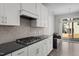 Well-equipped kitchen featuring stainless steel appliances, ample countertop space, and modern finishes at 2346 Mckenzie Ridge Ln, Apex, NC 27502