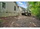The home has a backyard with natural views, a wooden deck, and is conveniently accessible from the house at 2425 Lemuel Dr, Raleigh, NC 27615