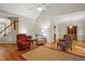 Open living area with vaulted ceilings, hardwood floors, and plenty of natural light at 2425 Lemuel Dr, Raleigh, NC 27615