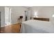 Bright main bedroom with ensuite bathroom and hardwood floors at 2425 Lemuel Dr, Raleigh, NC 27615