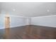 A spacious basement with recessed lighting and dark hardwood floors is the perfect canvas for creating new living space at 2508 Kearney Rd, Wake Forest, NC 27587
