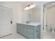 Bathroom features a stylish vanity with marble countertop, tiled floors, and a view of the shower at 2508 Kearney Rd, Wake Forest, NC 27587