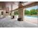 An outdoor living space with a pool, fireplace, and outdoor kitchen at 2508 Kearney Rd, Wake Forest, NC 27587