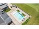 Overhead view of in-ground pool, patio with furniture and an outdoor fireplace at 2508 Kearney Rd, Wake Forest, NC 27587