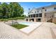 Backyard view showcasing a large pool and outdoor dining area at 2508 Kearney Rd, Wake Forest, NC 27587