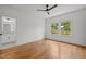 Bright bedroom features hardwood floors, ensuite bathroom and large windows at 2551 Drake Ave, Durham, NC 27705