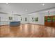 Spacious open floor plan with kitchen, living room, and hardwood floors at 2551 Drake Ave, Durham, NC 27705
