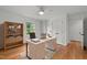 Bright home office with built-in shelves, a window view, and light wood floors at 2551 Drake Ave, Durham, NC 27705