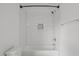 Contemporary shower with white subway tile surround, modern fixtures, and a built-in soap niche at 2551 Drake Ave, Durham, NC 27705