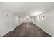 Spacious finished basement area with hardwood floors and natural light at 2617 Fayetteville St, Durham, NC 27707