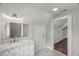 Attic bathroom featuring a vanity with a marble countertop at 2617 Fayetteville St, Durham, NC 27707
